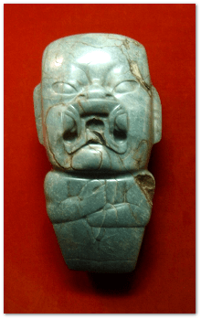 They call this  Olmec ritual axe with a were-jaguar motif the Kunz Axe.  He collected it in 1890 (and presumably had to flee a giant rolling boulder to escape alive).  Image source 